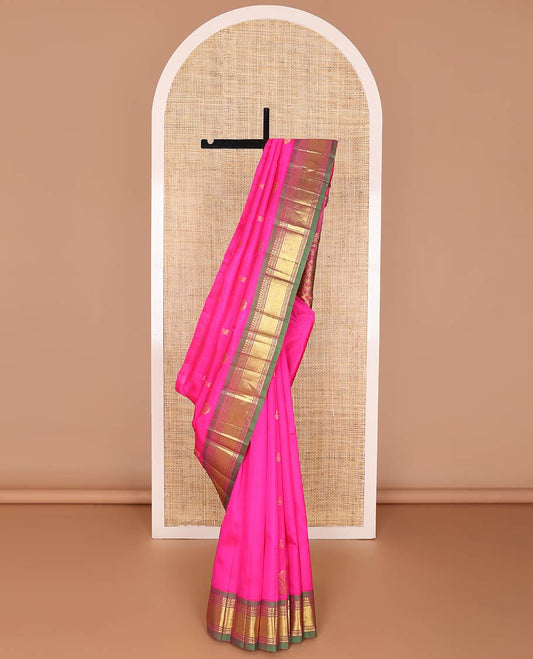 Pink zari buttas kancheepuram silk saree, contrast one-sided border of panner sombu, banaras, muthu & mayil kann & floral design pallu