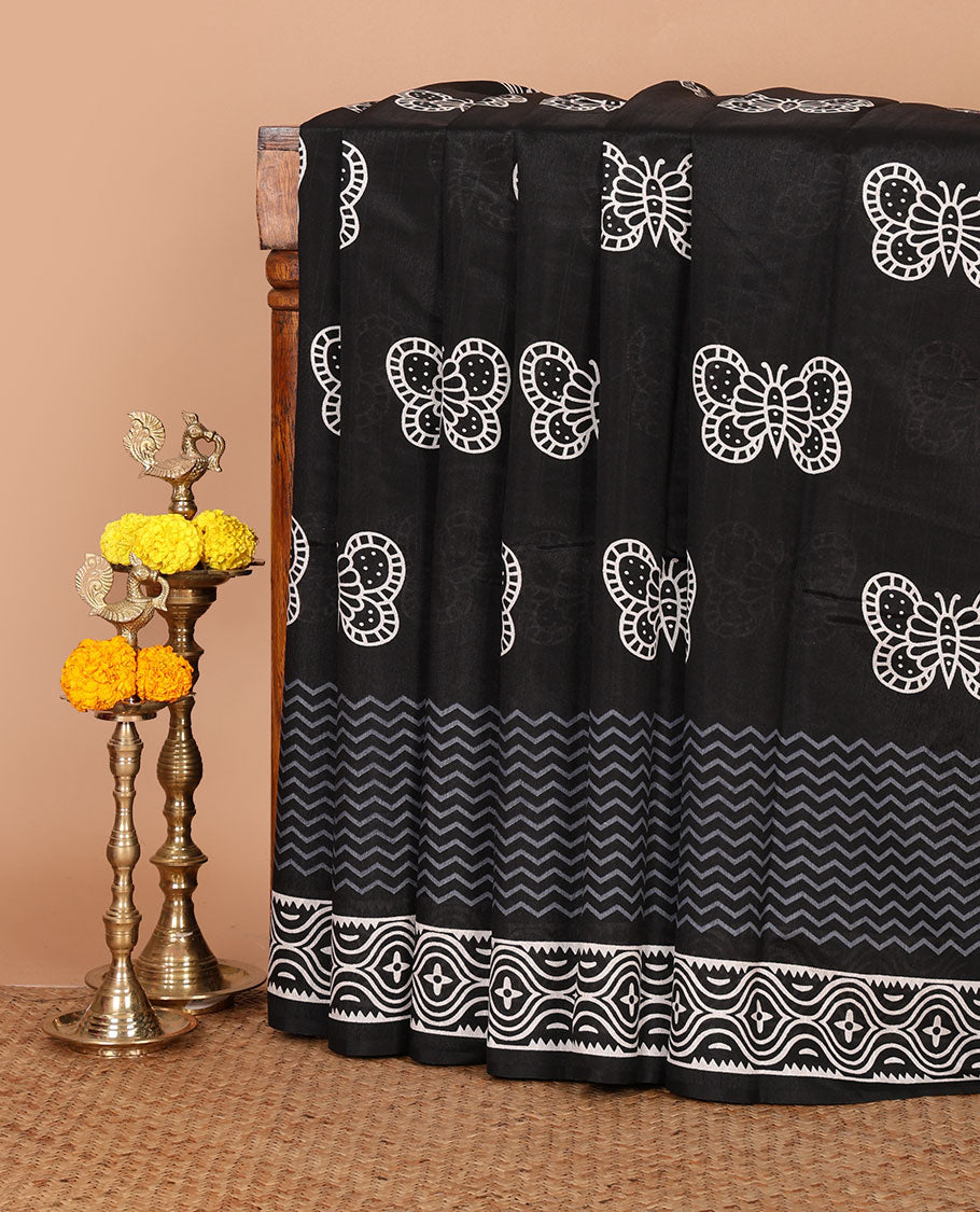 Black butterfly motifs handblock printed jute cotton saree, self-border & pallu of blockprinted geometric patterns & plain black blouse