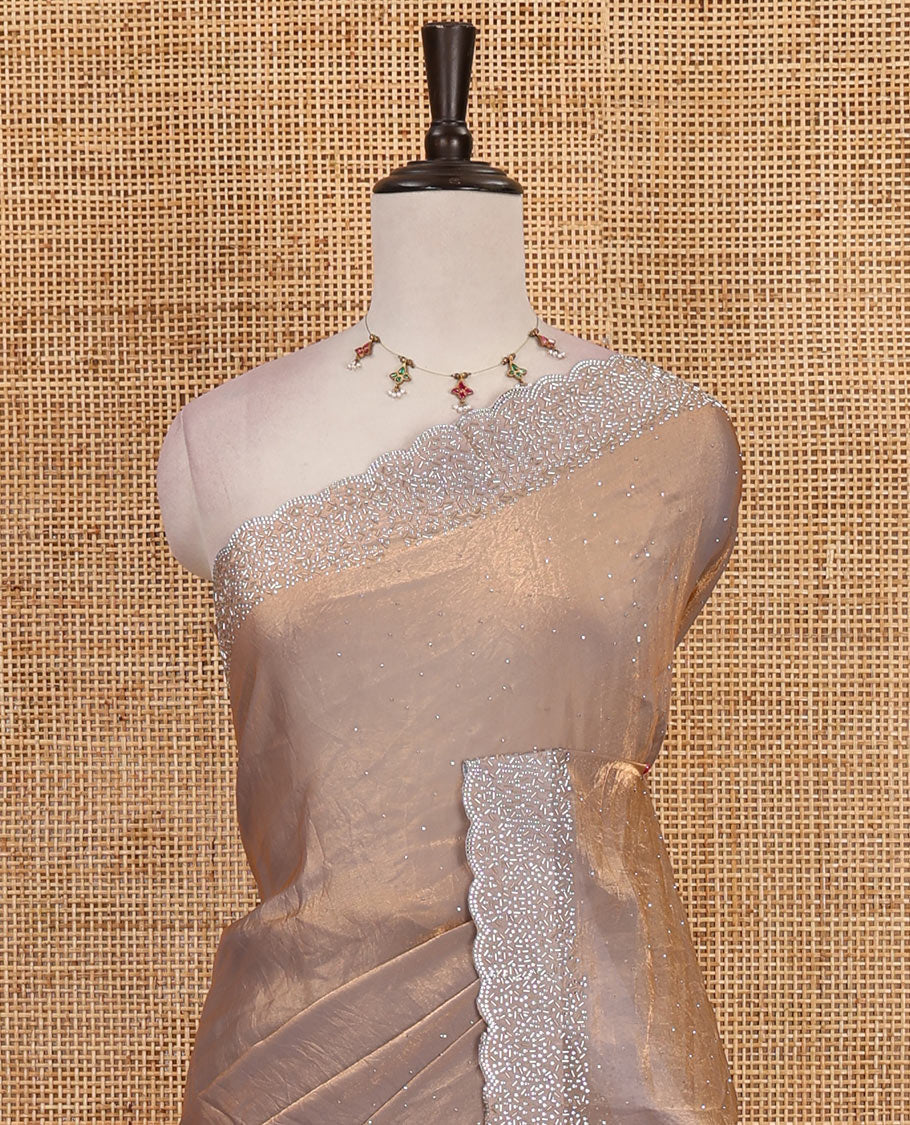 Grey Swarovski crystal stone embedded fendy chiffon saree, scallop Swarovski stone embroidered border, and contrast plain blouse