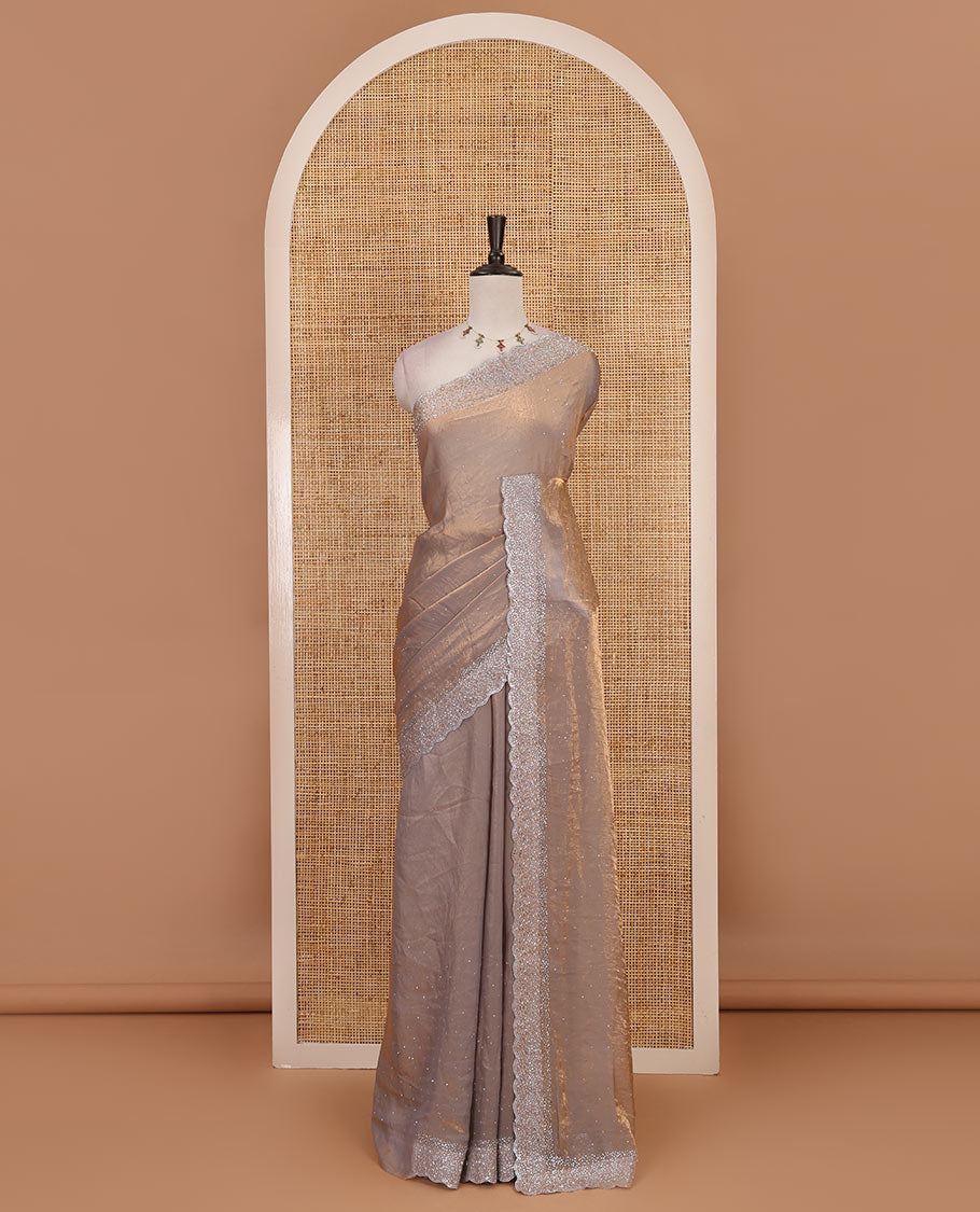 Grey Swarovski crystal stone embedded fendy chiffon saree, scallop Swarovski stone embroidered border, and contrast plain blouse