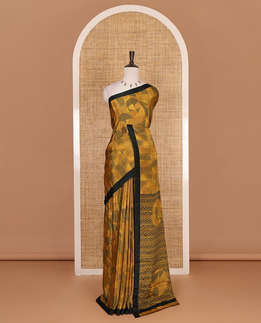 Mustard geometric patterns printed Turkey crepe saree, contrast printed piping border, printed pallu, and printed blouse