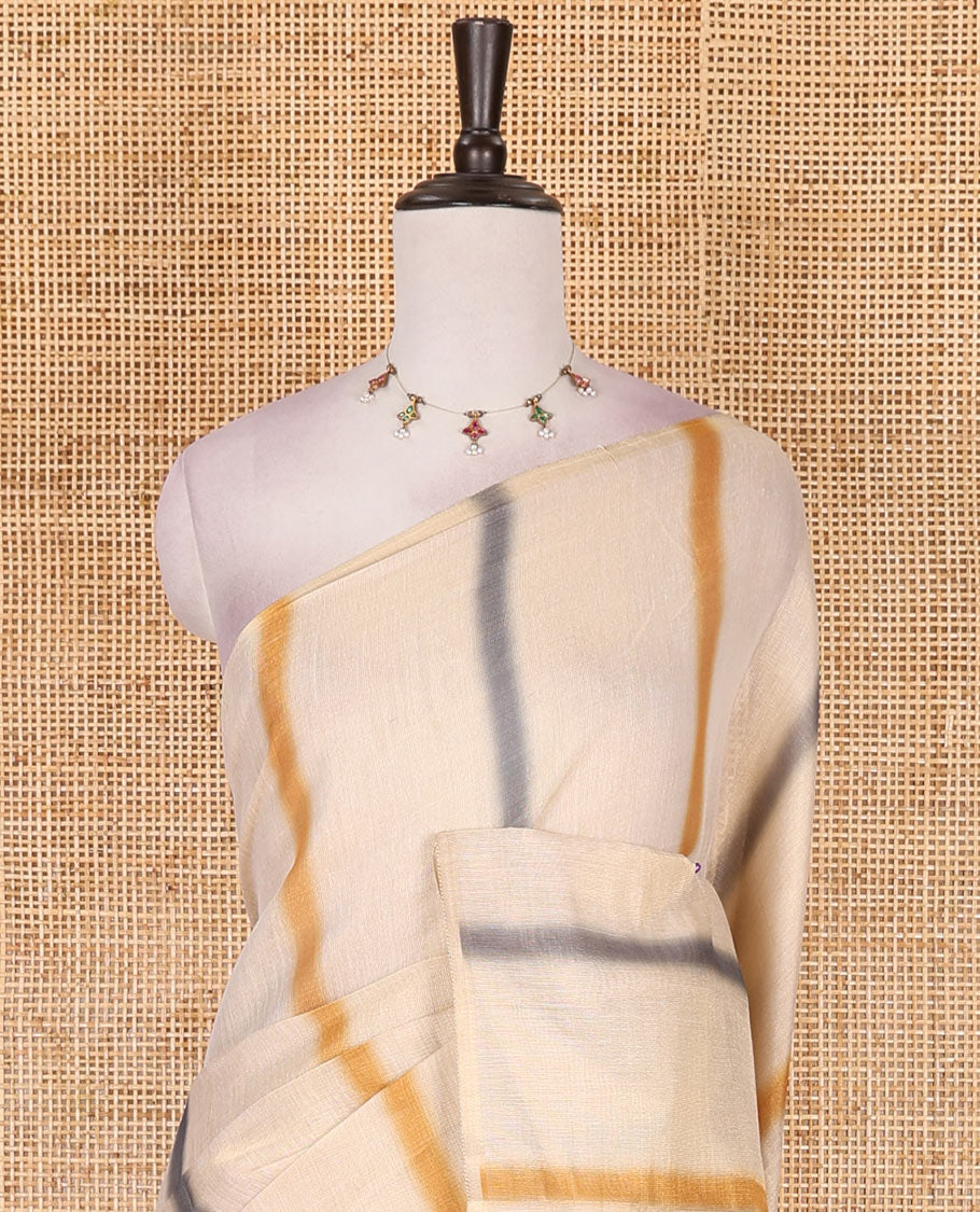 Borderless cream, colorful striped tissue saree, unique motifs printed mustard color blouse