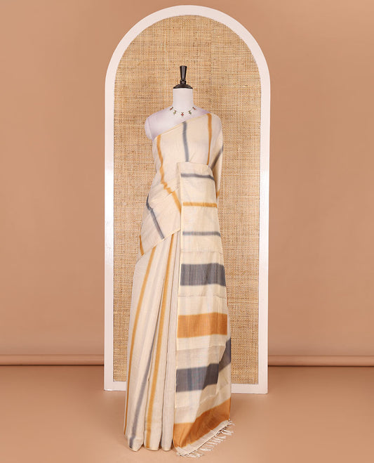 Borderless cream, colorful striped tissue saree, unique motifs printed mustard color blouse