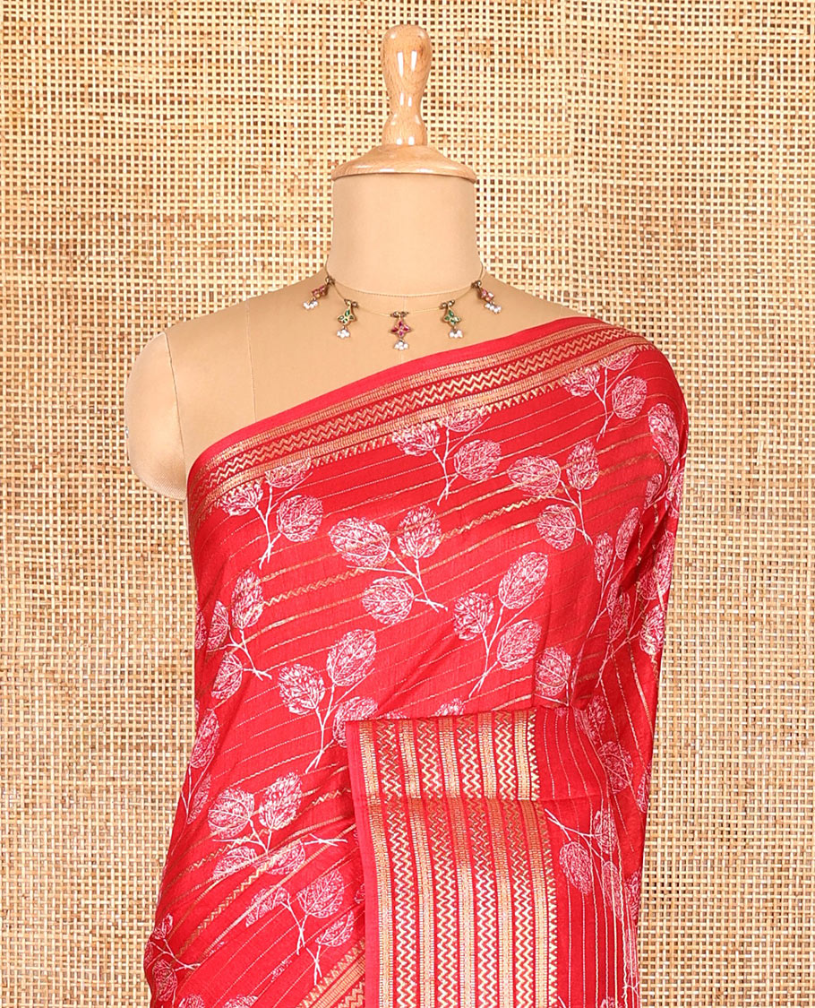 Red horizontal zari striped and triple-leaf printed Assam cotton saree, chevron stripes zari border, printed pallu, and a matching blouse of zari and print work