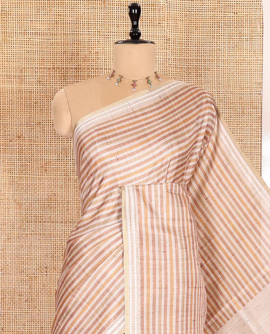 Yellow  Semi-Tussar Saree Featuring Horizontal Stripe Prints, Accentuated by a Subtle Resham Thread Temple-Designed Border, with a Pallu Highlighted by Intricate Circular Motifs, Paired with a Contrast Bandhani Blouse