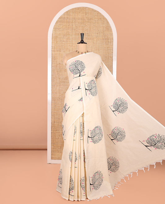 Borderless Cream South Cotton Saree, Adorned with Family-Tree-Style Printed All Over Its Body, Pallu Mirrors the Same Print, and Paired with One Matching Blouse, and One Contrast Paisley Printed Blouse