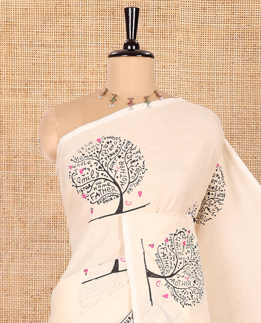 Borderless Cream South Cotton Saree, Adorned with Family-Tree-Style Printed All Over Its Body, Pallu Mirrors the Same Print, and Paired with One Matching Blouse, and One Contrast Paisley Printed Blouse