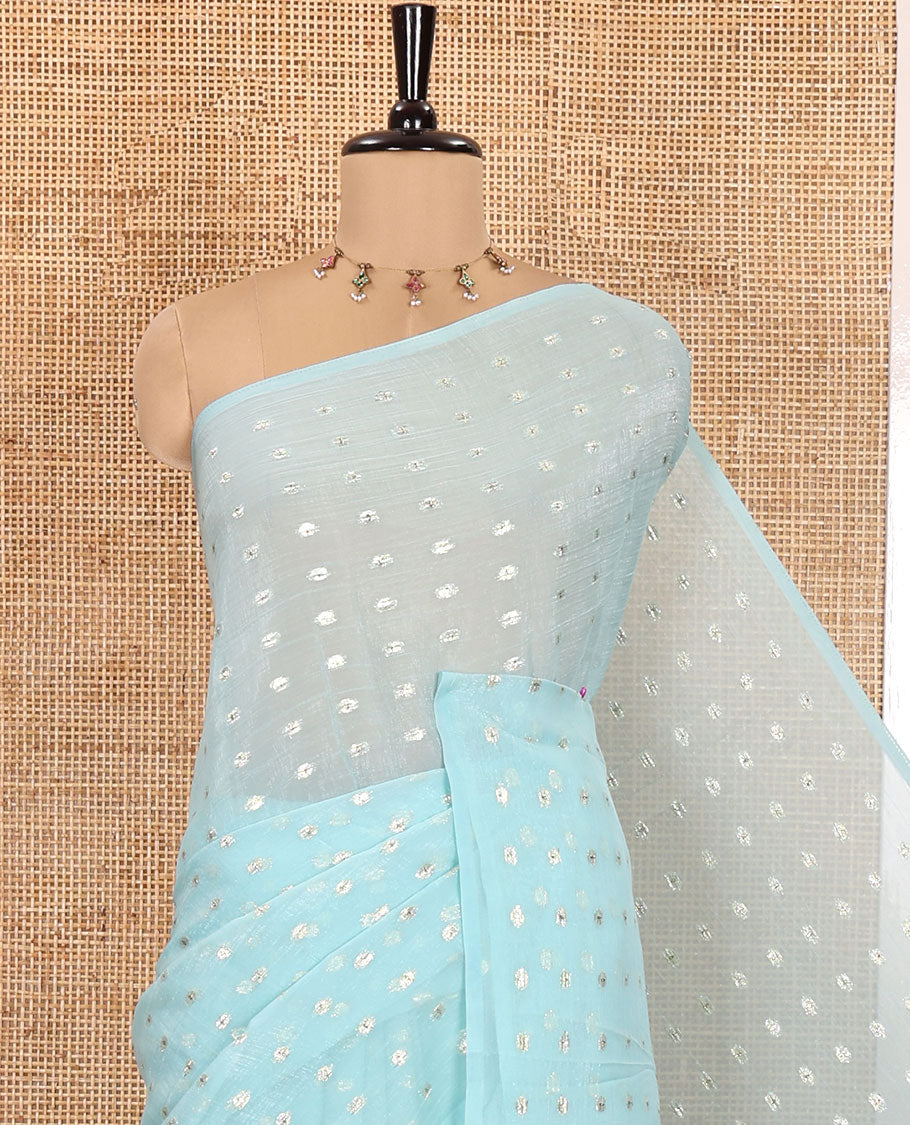 Borderless Light Blue Shimmer Saree, Gleamed up with Zari Buttas All Over Its Body, Pallu Mirrors the Same Buttas, and Comes Without a Blouse
