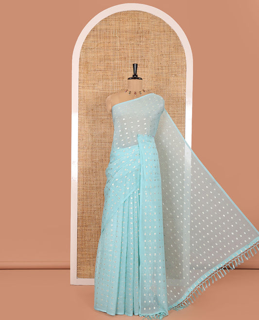 Borderless Light Blue Shimmer Saree, Gleamed up with Zari Buttas All Over Its Body, Pallu Mirrors the Same Buttas, and Comes Without a Blouse