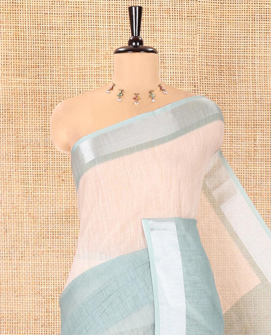 Pista Green Linen Cotton Saree, Adorned with Ombre-Style Double-Color Print, Highlighted by Contrast Zari Bavanji Border, Pallu Pictures Bandhani Design, and Paired with a Contrast Bandhani Blouse