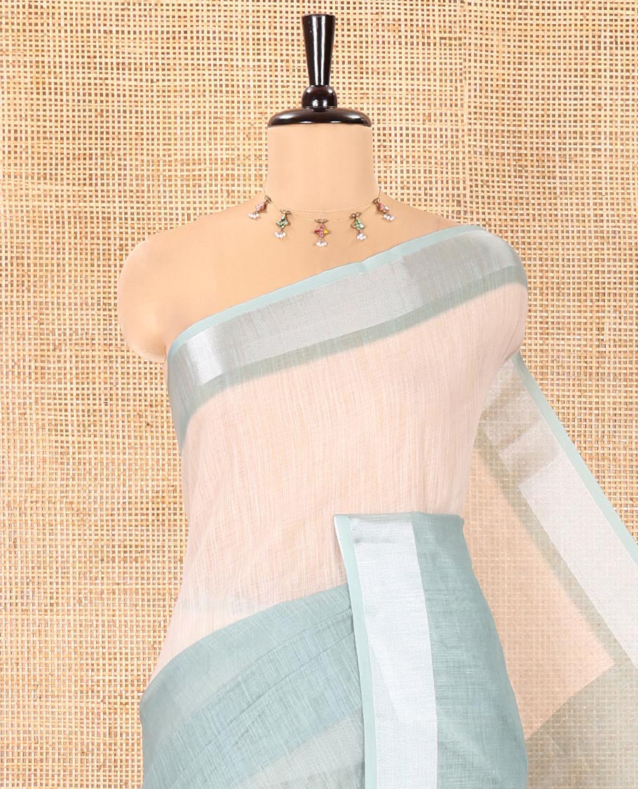 Pista Green Linen Cotton Saree, Adorned with Ombre-Style Double-Color Print, Highlighted by Contrast Zari Bavanji Border, Pallu Pictures Bandhani Design, and Paired with a Contrast Bandhani Blouse