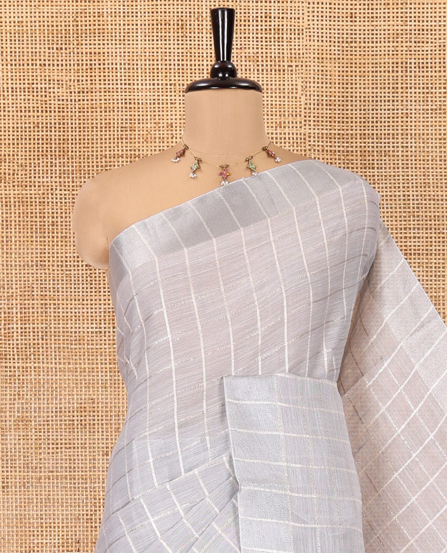 Grey Jute Linen Cotton Saree, Adorned with Checked Design on Its Body, a Subtle Self-Border, Striped Pallu, and Paired with a Matching Thread Embroidered Blouse