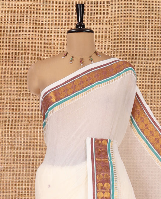 Cream Plain Khadi Mul Cotton Saree, Complemented by Contrast Traditional Zari Border of Rudraksham Motifs, a Self-Pallu, and Has No Blouse