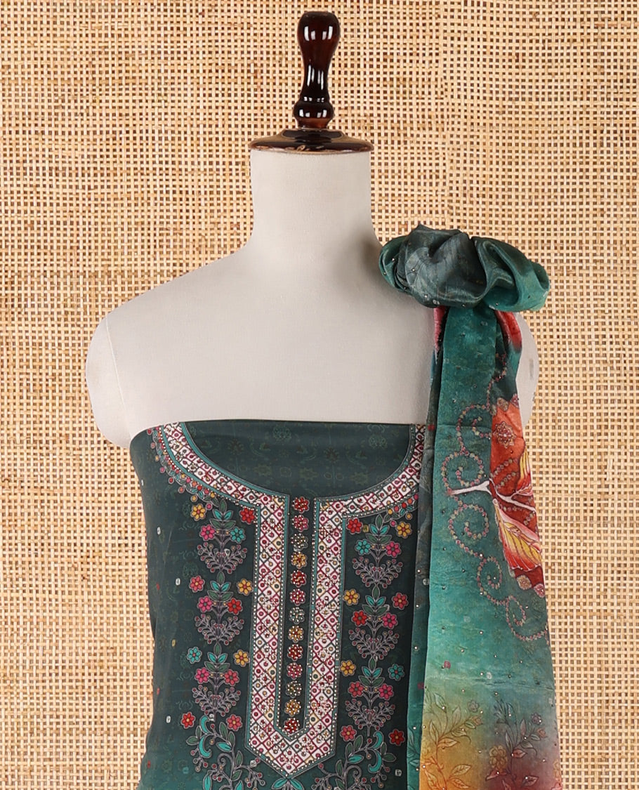 Bottle green chudidar material set, double-shaded daman flower design print with stone work crepe top, leaf motif print & lace work kaleidoscopic-colored chinon dupatta & plain crepe bottom