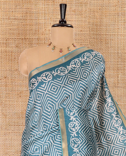 Rama blue diamond patterns batik printed banana pith saree, printed piping border, printed pallu, and a matching blouse