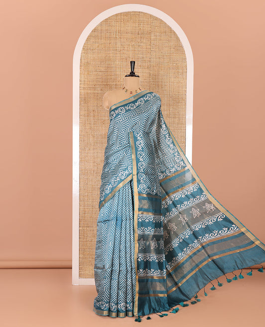 Rama blue diamond patterns batik printed banana pith saree, printed piping border, printed pallu, and a matching blouse