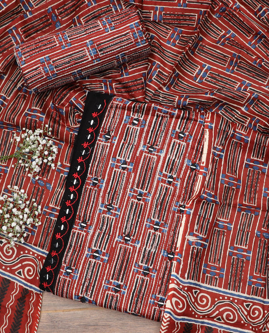 Terracotta red material chudidar set, batik leheriya striped with mirror embroidered top, printed bottom and batik printed dupatta