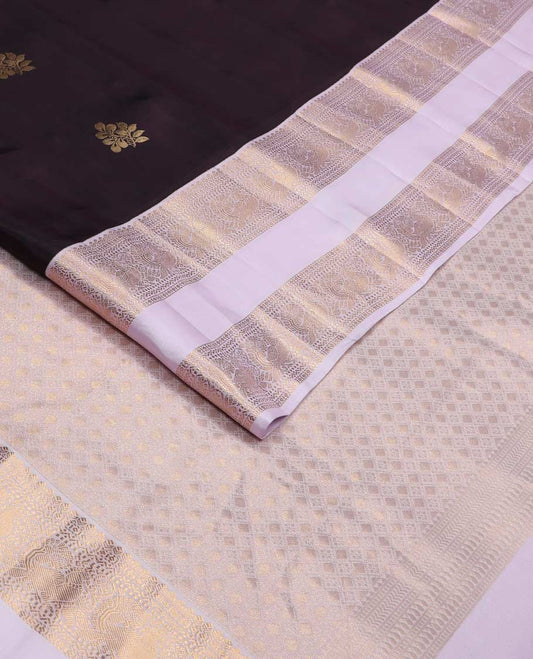Brown zari buttas Vasundhara silk mix saree, contrast border of thilakam, neli, muthu, and mayil designs, and jaal pallu