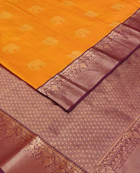 Yellow mayil and yaanai buttas silk saree, contrast border of thilakam mokku, neli, manga and yaali designs and jaal pallu