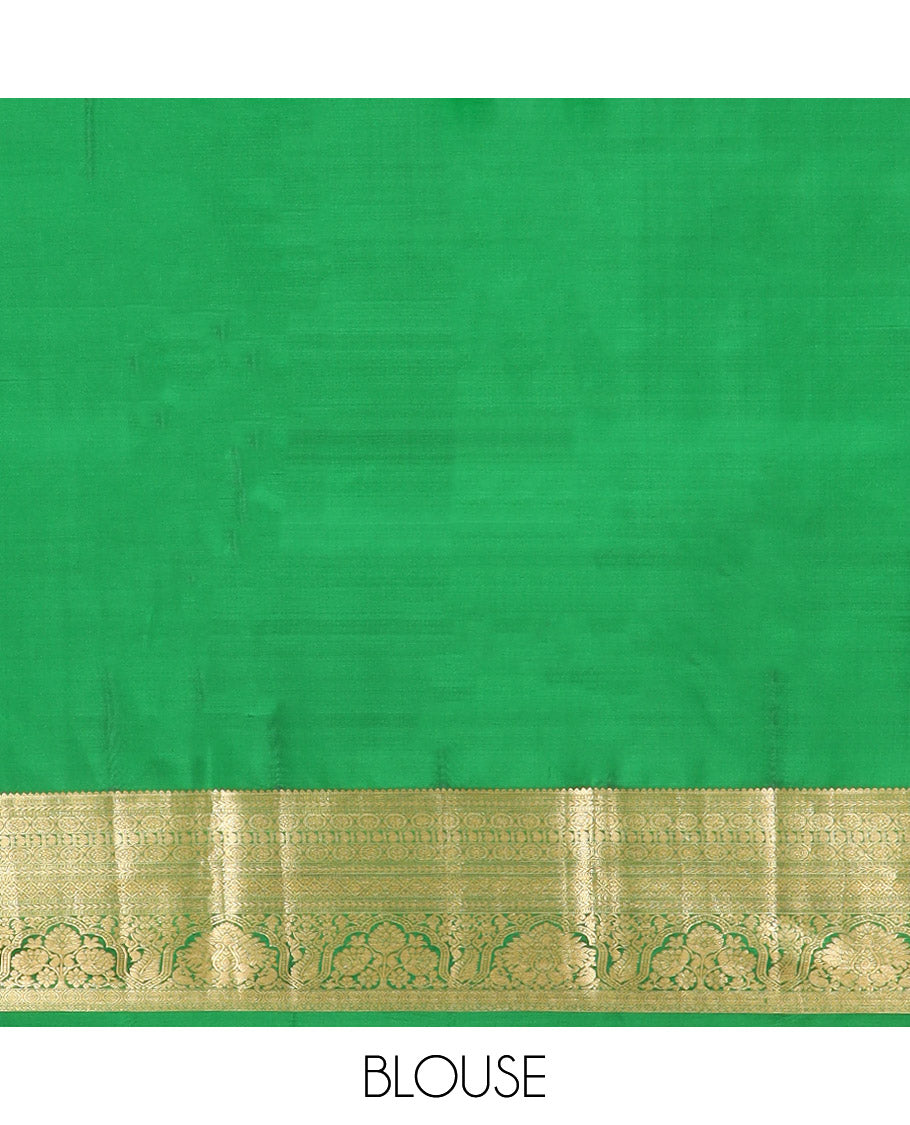 Green Kanchipuram Silk Saree Embellished with Jacquard Design, Highlighted by a Contrast Border of Thilakam, Muthu, Rekku, Manga, Chakram, and Floral Designs, Majestically Woven Pallu Steeped with Chakram Designs, and Paired with a Matching Blouse