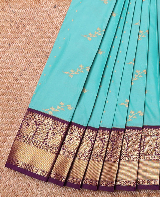 Blue Budget Silk Saree, Enriched with Zari Buttas on Its Body, Complemented by a Contrast Traditional Zari Border of Paisleys, Pallu Steeped with Paisley Designs, and Paired with a Contrast Blouse