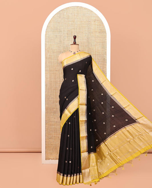 Black Assam Silk Saree, Bedecked with Flower Buttas, Complemented by a Contrast Traditional Border, Zari-Design Pallu, and a Contrast Blouse