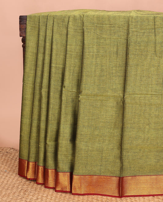 Green plain Narayanapet cotton saree, contrast zari border, and striped pallu