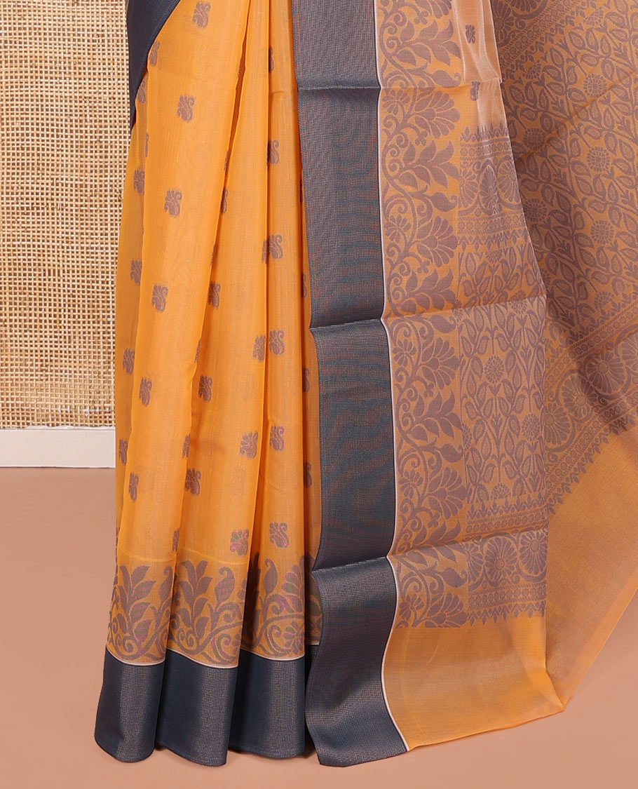 Orange Semi-Silk Cotton Saree, Designed with Buttas All Over Its Body, Complemented by a Contrast Border, Pallu of Floral-Leaf Designs, and Paired with a Matching Blouse