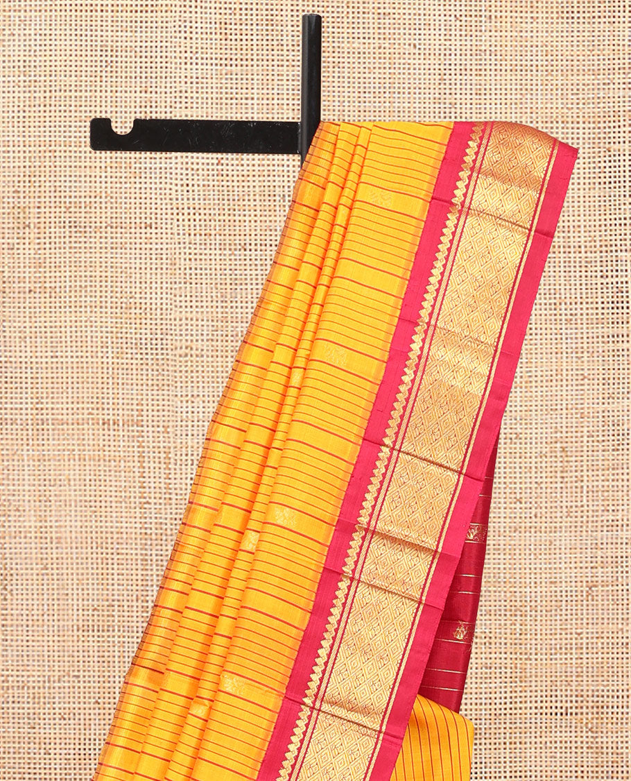 Orange Striped Kanchipuram Silk Saree, Woven with Zari Buttas, Complemented by a Contrast Korvai Border of Thilakam Mokku, Banaras, Muthu, and Jaal Design, Zari Design Pallu, and No Blouse