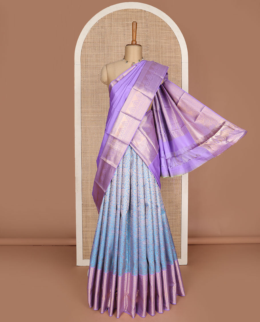 Green pure-silk half-saree, jacquard skirt, contrast blouse, and border of Mughal-style zari designs, and intricate dhavani