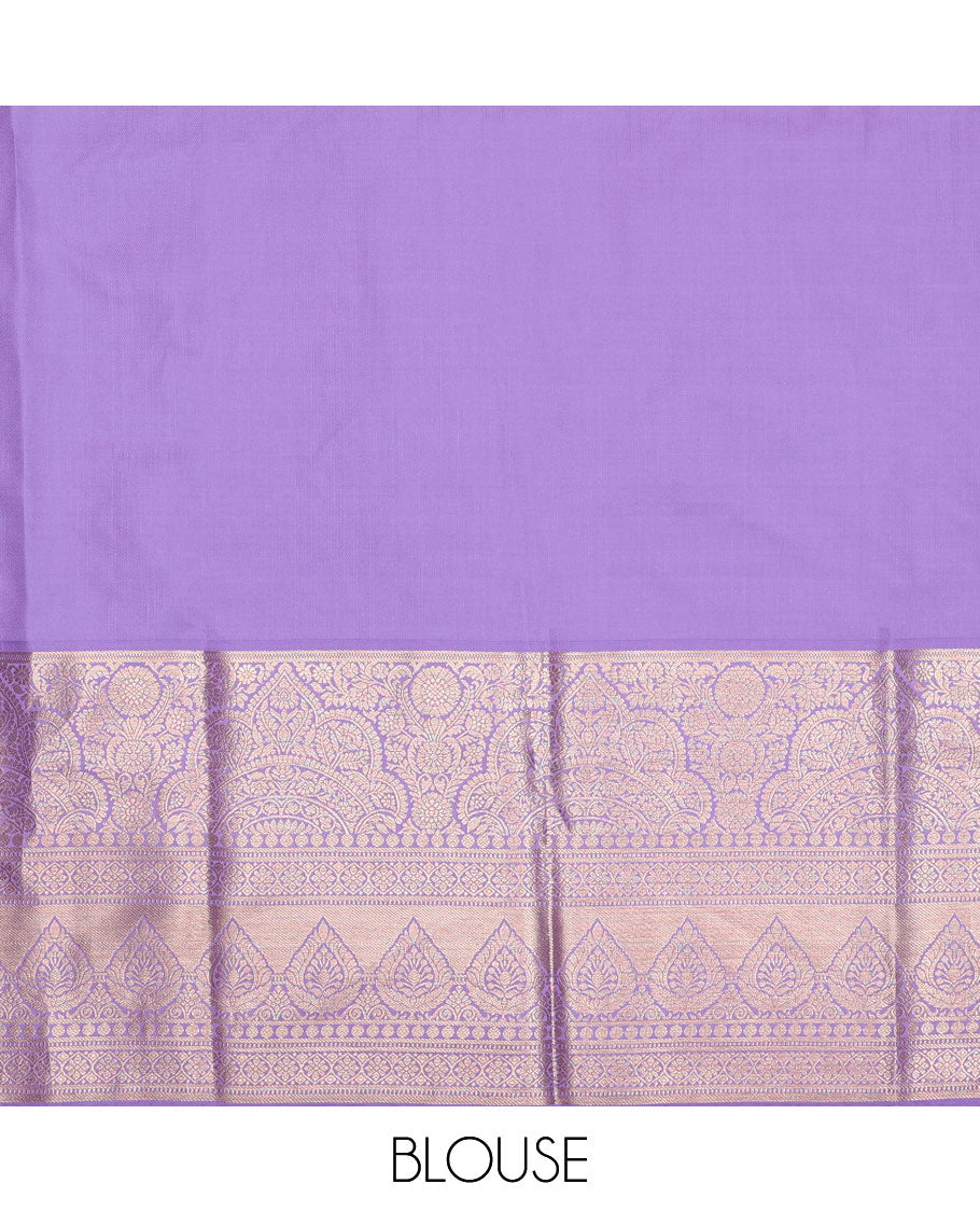 Green pure-silk half-saree, jacquard skirt, contrast blouse, and border of Mughal-style zari designs, and intricate dhavani