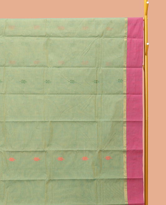 Green Kanchi Cotton Saree, Ornamented with Buttas, Contrast Border, Pallu of Floral Design, and a Matching Blouse