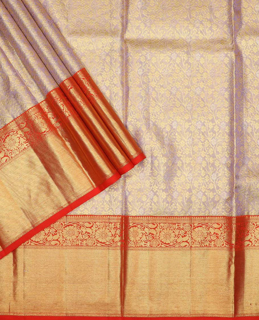 Grey pure silk half saree, floral vine jacquard, contarst jacquard blouse and border of thilakam, muthu, neli and kodi visiry, and jaal design dhavani