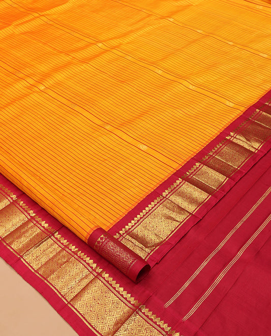 Orange Striped Kanchipuram Silk Saree, Woven with Zari Buttas, Complemented by a Contrast Korvai Border of Thilakam Mokku, Banaras, Muthu, and Jaal Design, Zari Design Pallu, and No Blouse