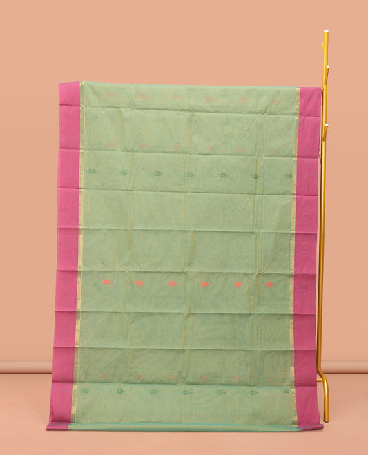 Green Kanchi Cotton Saree, Ornamented with Buttas, Contrast Border, Pallu of Floral Design, and a Matching Blouse