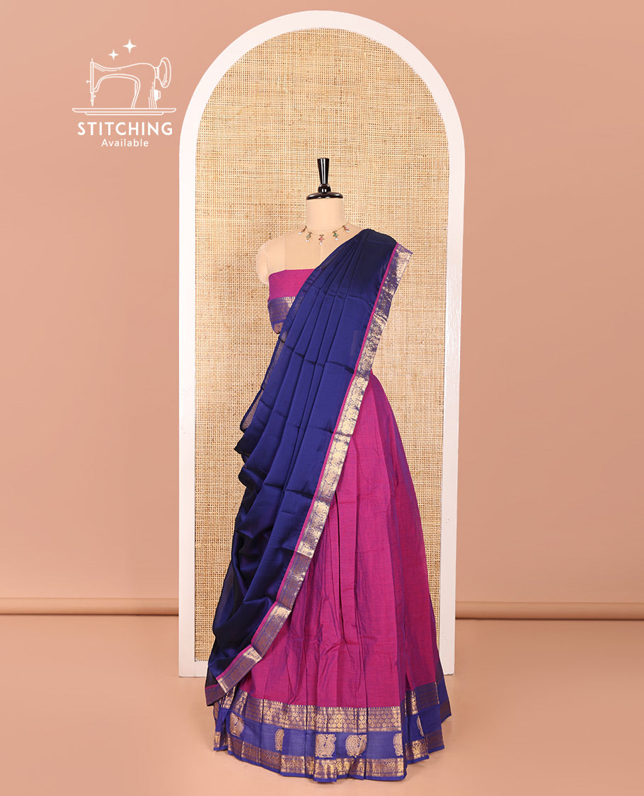 Magenta and Blue Sungudi Cotton Half-Saree Featuring Plain Skirt, Adorned with a Contrast Traditional Motifs Woven Zari Border of Annam Motifs, Paired with a Matching Blouse, and Contrast Syska Georgette Dhavani with Zari Border