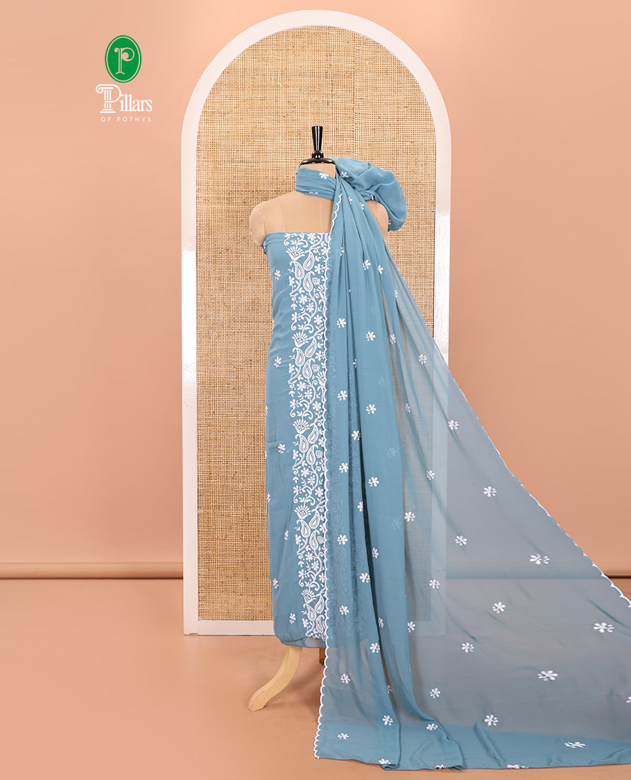 Ferozi Blue Material Chudidar Set Featuring Chikankari-Style Paisley Vine Design, Thread-Embroidered Georgette Top, Subtly Made Plain Santoon Material Bottom, and a Floral Motifs-Embroidered Georgette Scallop-Bordered Dupatta