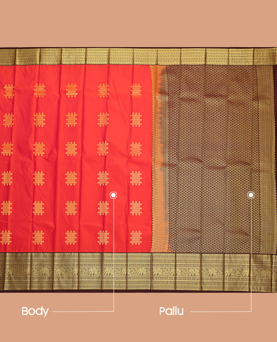 Orange Budget Silk Saree Features Kolam Buttas, Complemented by a Contrast Traditional Zari Border, Grand Pallu, and a Contrast Blouse