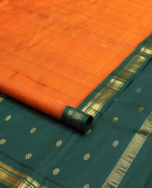 Orange zari buttas kanchipuram silksaree, contrast one-sided border of manga,banaras & mayil kann & zari design pallu
