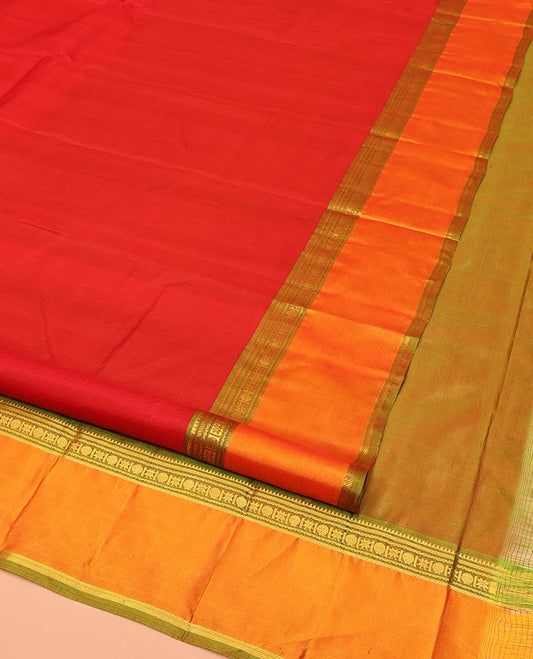 Red Plain Kanchipuram Silk Saree, Complemented by a Contrast Rettai Pettu Border of Rekku, Banaras, Neli, Rudraksham, and Vanki Star Designs, Sparsely Woven Pallu, and Paired with a Contrast Blouse