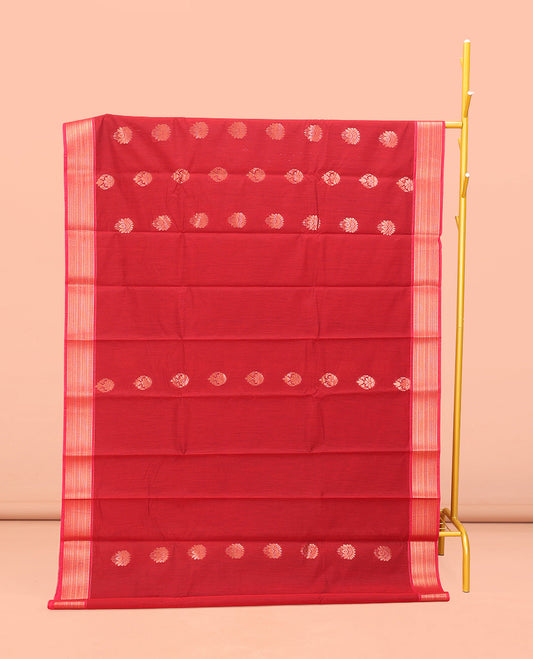 Red Semi-Silk Cotton Saree, Zari-Gleamed Up with Buttas All Over Its Body, Highlighted by a Traditional Zari Border, Pallu of Paisley Designs, and Paired with a Matching Blouse
