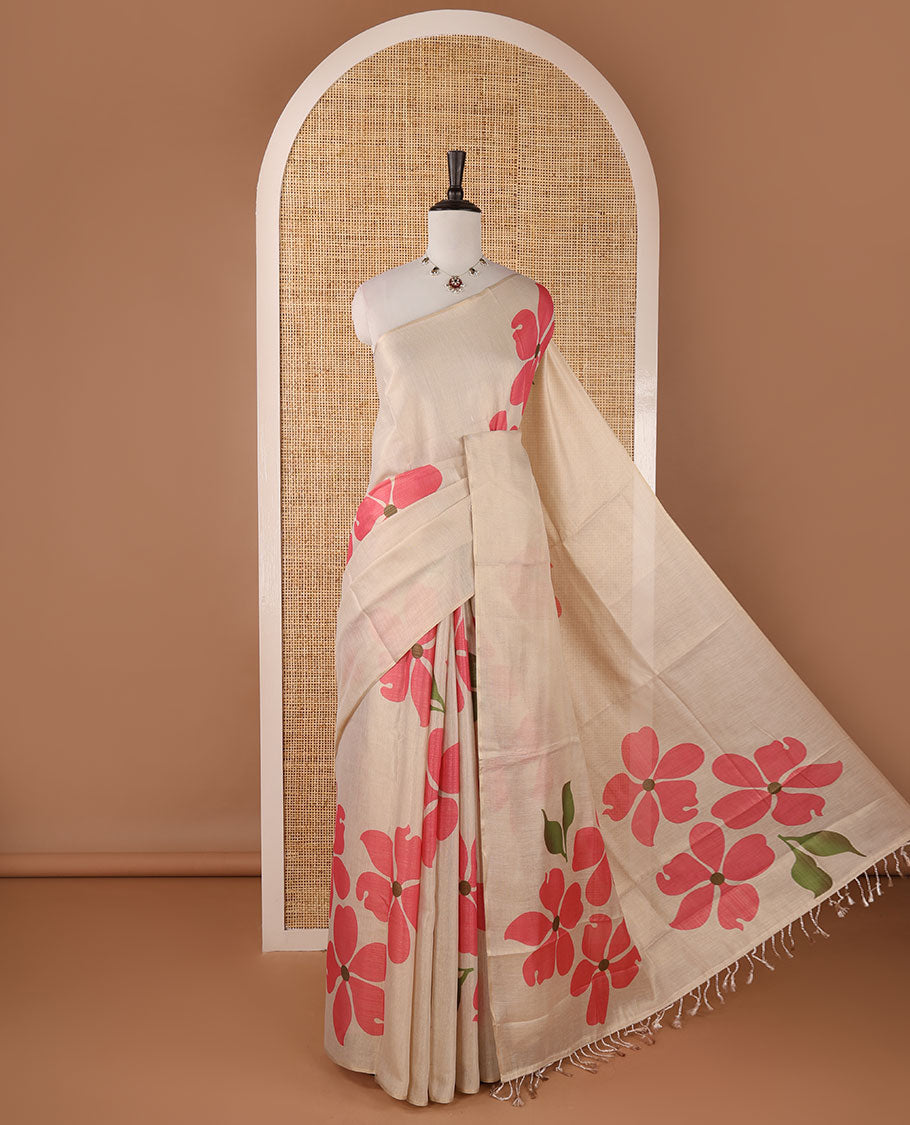 Borderless cream printed onam tissue silk saree features pink color five-petal flower & leaf motifs print, matching floral print blouse
