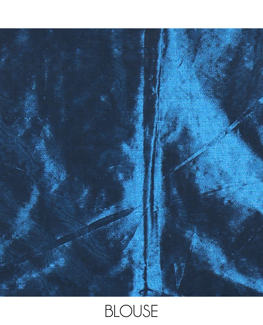 Borderless blue mirror work khadi tissue saree, mirror work pallu, and a matching blouse