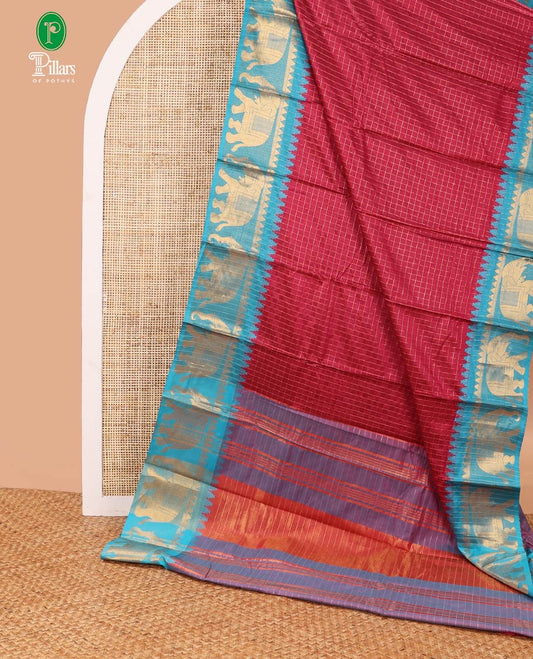 Rani pink zari checked design dola silk saree with contrast elephant design border & chit pallu along with checked design blouse