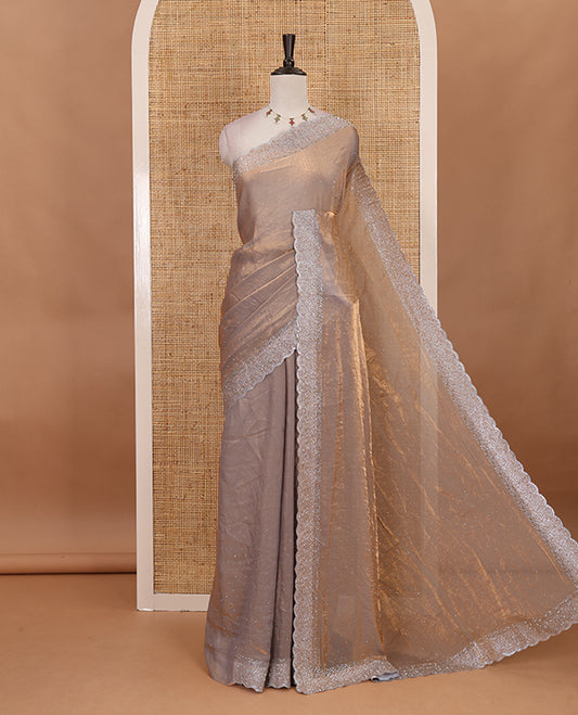 Grey Swarovski crystal stone embedded fendy chiffon saree, scallop Swarovski stone embroidered border, and contrast plain blouse