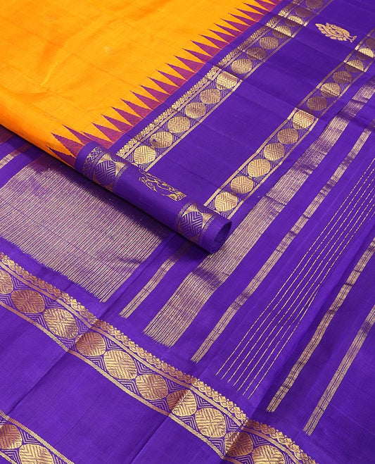 Orange buttas kancheepuram silk saree with contrast rettai prttu border of thilakam mokku, banaras, paun design & striped pallu