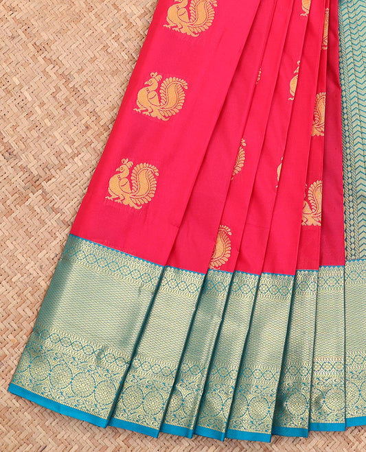 Red Budget Silk Saree, Artfully Detailed with Peacock Buttas All Over Its Body, Complemented by a Contrast Traditional Zari Design Border, Grand Pallu, and Paired with a Contrast Blouse