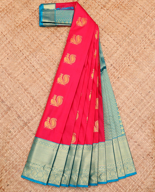 Red Budget Silk Saree, Artfully Detailed with Peacock Buttas All Over Its Body, Complemented by a Contrast Traditional Zari Design Border, Grand Pallu, and Paired with a Contrast Blouse