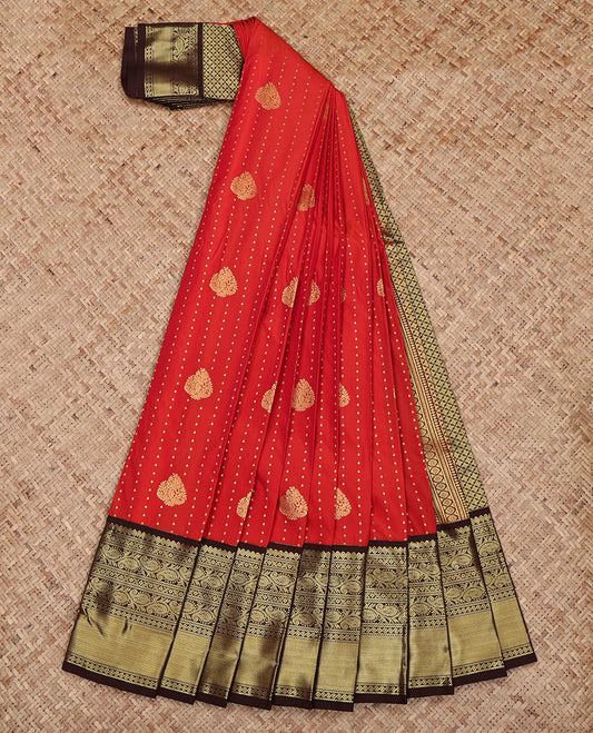 Red Budget Silk Saree, Steeped in Richness of Zari Buttas All Over Its Body, Complemented by a Contrast Traditional Zari Design Border, Grand Jaal Pallu, and Paired with a Contrast Blouse