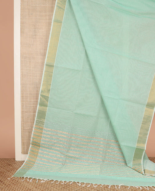 Green sparsely striped jute cotton saree, zari bavanji border, and zari striped pallu